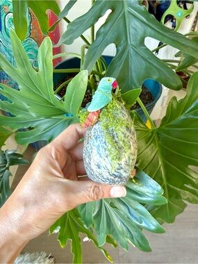 Gemstone parrot carving on Dendritic Opal